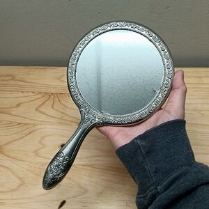 Elegant Silver Handheld Mirror